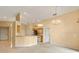 Kitchen with breakfast bar, stainless steel appliances, and chandelier at 14783 Yorkshire Run Dr, Orlando, FL 32828