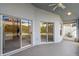 Spacious screened-in porch with sliding glass doors at 14783 Yorkshire Run Dr, Orlando, FL 32828