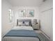 Serene bedroom with a comfortable bed and calming color scheme at 15322 Sw 50Th Court Rd, Ocala, FL 34473