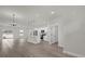 Open-concept living space featuring a kitchen, dining area, and a bright and airy living room at 15568 Sw 46Th Cir, Ocala, FL 34473