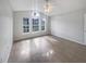Bright bedroom with tile flooring and large windows at 161 Pinefield Dr, Sanford, FL 32771