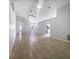 Open living room with tile floors and access to kitchen at 161 Pinefield Dr, Sanford, FL 32771