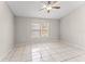 Spacious bedroom with tile flooring and plenty of natural light at 2317 Santa Lucia St, Kissimmee, FL 34743