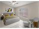 Comfortable bedroom featuring a large window and neutral decor at 2317 Santa Lucia St, Kissimmee, FL 34743