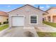 Charming single-Gathering home with a one-car garage and well-maintained landscaping at 2317 Santa Lucia St, Kissimmee, FL 34743
