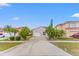 Charming single-story home with a well-manicured lawn and a private driveway, great curb appeal at 2317 Santa Lucia St, Kissimmee, FL 34743