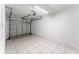 Clean garage space featuring tile flooring and ample room at 2317 Santa Lucia St, Kissimmee, FL 34743