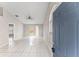 Bright living room with vaulted ceiling and tile floors, filled with light at 2317 Santa Lucia St, Kissimmee, FL 34743