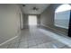 Spacious living room with tiled floors and neutral walls at 2317 Santa Lucia St, Kissimmee, FL 34743