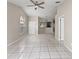 Open-concept living room featuring tile flooring and modern decor at 2317 Santa Lucia St, Kissimmee, FL 34743