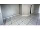 Bright living room features neutral walls and tile flooring at 2317 Santa Lucia St, Kissimmee, FL 34743