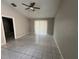 Large living room with tile floors and sliding glass doors at 2317 Santa Lucia St, Kissimmee, FL 34743
