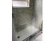 Clean shower with tiled walls and a glass enclosure at 2317 Santa Lucia St, Kissimmee, FL 34743