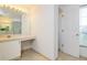 Clean bathroom with a vanity, toilet and access to another room at 2543 Sage Dr, Kissimmee, FL 34758
