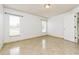 Spacious bedroom featuring tile floors and ample natural light at 2543 Sage Dr, Kissimmee, FL 34758