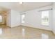 Bright bedroom with tile flooring and large windows at 2543 Sage Dr, Kissimmee, FL 34758