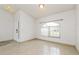 Clean and bright entryway with tile floors and arch window at 2543 Sage Dr, Kissimmee, FL 34758