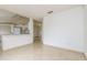 Kitchen with breakfast bar and access to the living area at 2543 Sage Dr, Kissimmee, FL 34758