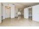 Bright and spacious living area with tile floors and access to the kitchen at 2543 Sage Dr, Kissimmee, FL 34758