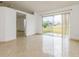 Living room with sliding glass doors leading to backyard and tile floors at 2543 Sage Dr, Kissimmee, FL 34758