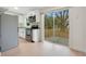 Modern kitchen with stainless steel appliances and white shaker cabinets at 2913 W Amelia St, Orlando, FL 32805