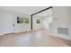 Spacious living area with new flooring and neutral wall colors at 2913 W Amelia St, Orlando, FL 32805