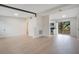 Open concept living space showcasing modern kitchen and backyard access at 2913 W Amelia St, Orlando, FL 32805