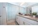 Double vanity bathroom with gray countertops and modern fixtures at 2974 Protagonist St, Kissimmee, FL 34746