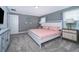Spacious bedroom with king-size bed and plenty of closet space at 2974 Protagonist St, Kissimmee, FL 34746