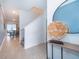 Bright and spacious entryway with tile flooring and modern decor at 2974 Protagonist St, Kissimmee, FL 34746
