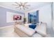 Cozy living room featuring a large sectional sofa, modern decor, and sliding glass doors to outdoor patio at 2974 Protagonist St, Kissimmee, FL 34746