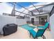 Private screened-in pool with lounge chairs at 2974 Protagonist St, Kissimmee, FL 34746