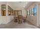 Sunroom with wicker dining set and large windows at 3024 Harbour Landing Way, Casselberry, FL 32707