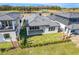 Aerial view of house backyard and golf course at 3032 Kensington Ave, Davenport, FL 33837
