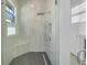 Walk-in shower with built-in seat and modern fixtures at 3032 Kensington Ave, Davenport, FL 33837