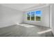 Spacious bedroom with large windows and hardwood floors at 3032 Kensington Ave, Davenport, FL 33837