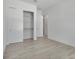 Bright bedroom with large closet and wood-look floors at 3032 Kensington Ave, Davenport, FL 33837