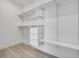 Large walk-in closet with ample shelving and drawers at 3032 Kensington Ave, Davenport, FL 33837