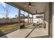 Relaxing screened porch with seating and ceiling fans at 3046 Slough Creek Dr, Kissimmee, FL 34744