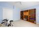 Bedroom with built-in shelves and workout equipment at 3736 Brookmyra Dr, Orlando, FL 32837