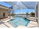 Relaxing pool area with lake view and covered patio at 3736 Brookmyra Dr, Orlando, FL 32837