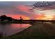 Stunning sunset over lake and golf course community at 3736 Brookmyra Dr, Orlando, FL 32837