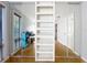 Spacious bedroom with mirrored sliding doors and built-in shelving at 421 Sheoah Blvd # 5, Winter Springs, FL 32708