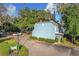 Exterior view of the building and surrounding landscape at 421 Sheoah Blvd # 5, Winter Springs, FL 32708