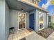 Townhome entryway with tiled flooring and a blue door at 421 Sheoah Blvd # 5, Winter Springs, FL 32708