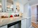 Modern kitchen with white cabinets and granite countertops at 421 Sheoah Blvd # 5, Winter Springs, FL 32708
