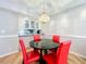 Kitchen features white cabinets and granite countertops at 421 Sheoah Blvd # 5, Winter Springs, FL 32708