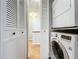 Convenient laundry closet with stacked washer and dryer at 421 Sheoah Blvd # 5, Winter Springs, FL 32708