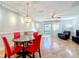 Living area features hardwood floors, a couch, and sliding glass doors to a patio at 421 Sheoah Blvd # 5, Winter Springs, FL 32708