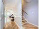 Wooden staircase with heart accents in the entryway at 421 Sheoah Blvd # 5, Winter Springs, FL 32708